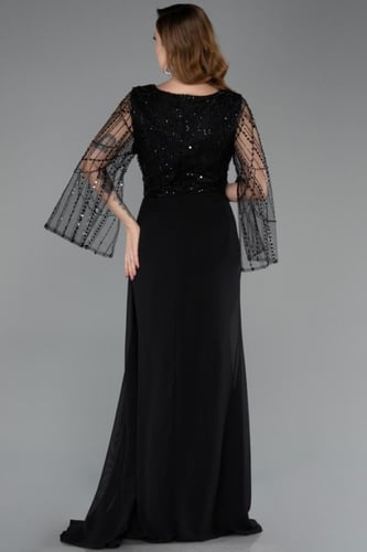 فستان سهرة بأكمام طويلة شفافة