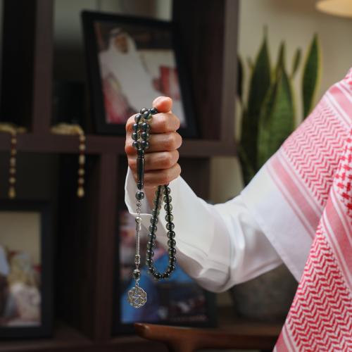 سبحة بكلايت زيتي شفاف بخيط اسود | طربزونة معدنية