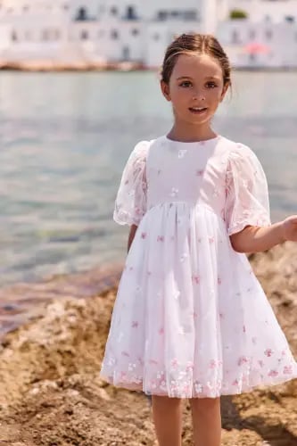 فستان مناسبات وردي من التول بالزهور