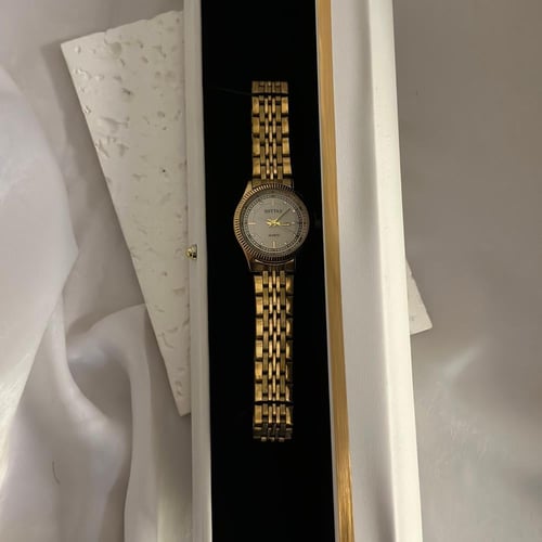 ساعه ذهبيه مطلي ذهب