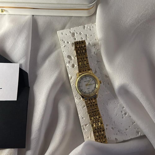 ساعه ذهبيه مطلي ذهب