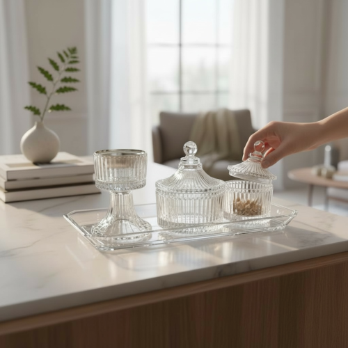 طقم ضيافة زجاج يحتوي على صينية فيها مبخرة وتمرية و...