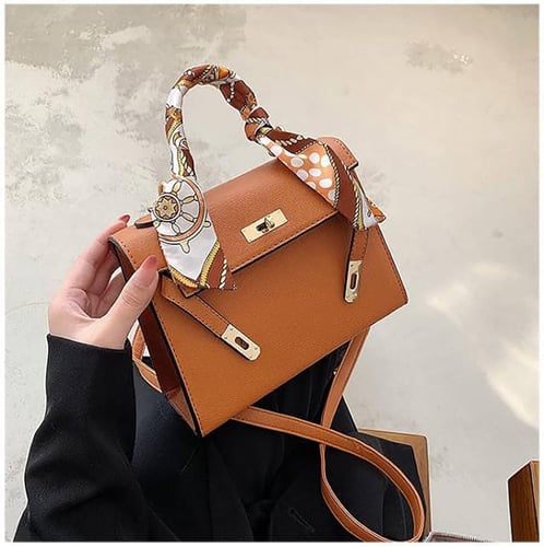 شنطة هارمز برتقالي مائل للبني