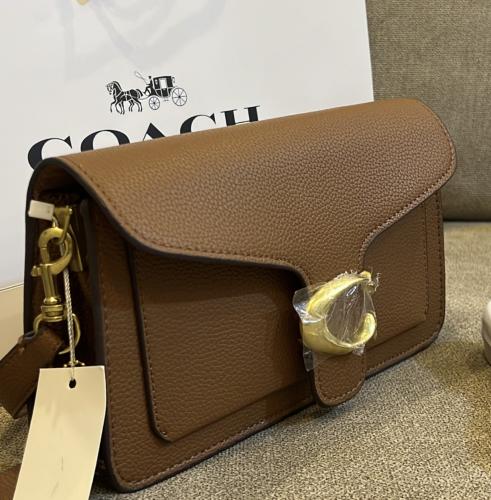 شنطة coach | كوتش تابي لون بني