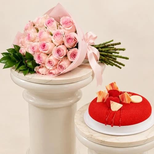 A bouquet of 20 roses with cake from Annie and Dani