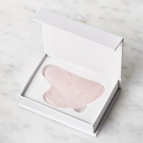 قوا شا اداة مساج للوجه