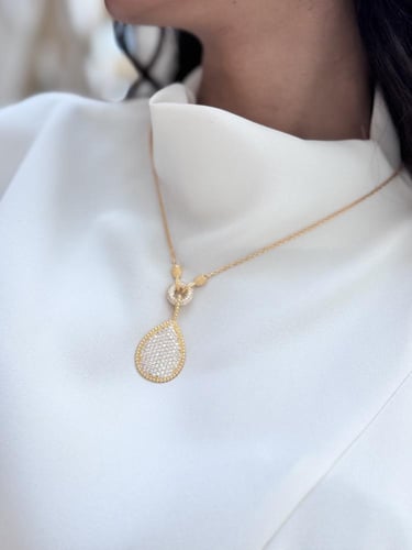 طقم (سلسال بوشرن طويل + حلق) مطليين