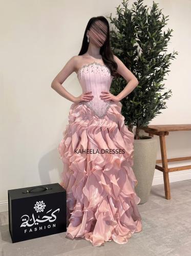 Dress with graduated cuts