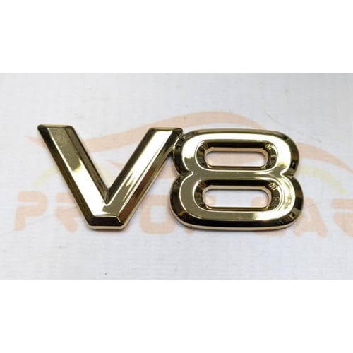 علامة V8 لاندكروزر 98 - 2007 ذهبي كوبي