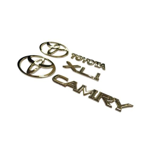 طقم علامات كامري 98 - 2002 ذهبي طبق الوكالة