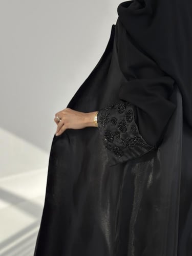 78# عباية قماش كتان مع اورقنزا واكمام شك يدوي قصة...