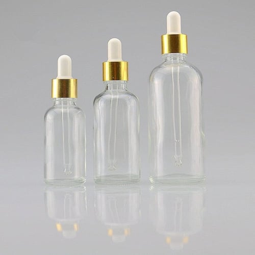 كرتون قوارير زجاج سعة 30 مل مع قطارة على المنضدة (...