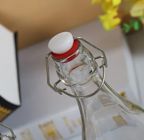 كرتون قوارير زجاج بغطاء كبس شفاف 1000 مل بغطاء كبس...