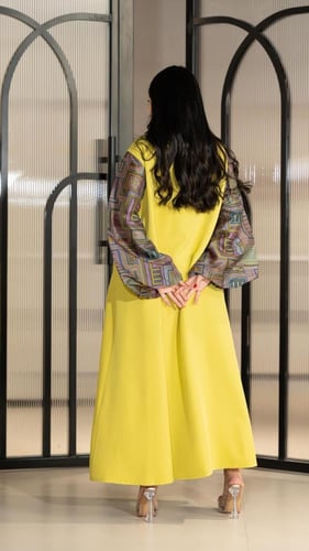 جلابية بلون اصفر مطرزة شك يدوي