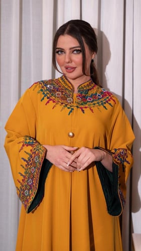 جلابية بلون اصفر وبتطريز ملون