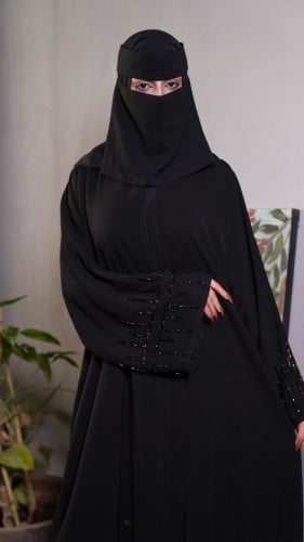 عباية بأكمام شك