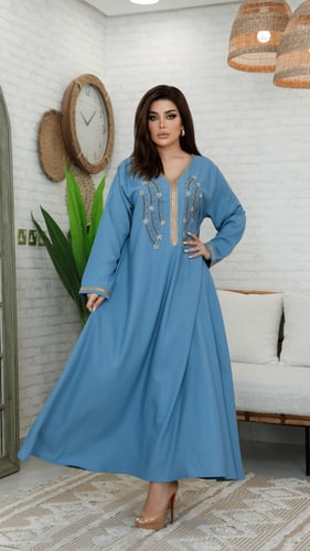 جلابية بلون سماوي مطرزه بذهبي