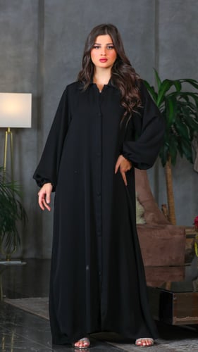 عبايه تقفل بأزرة قماش و كم مطاط