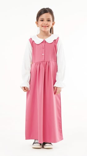 مريول ابتدائي بلون وردي وقميص مشبوك