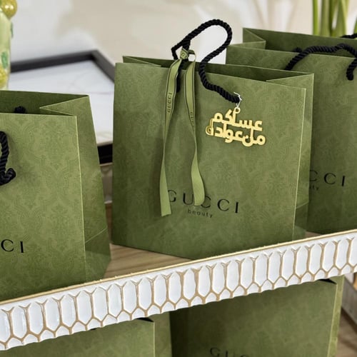 شنطة قوتشي مع مرايا وعطر 10 مل وكيس قوتشي الاخضر -...