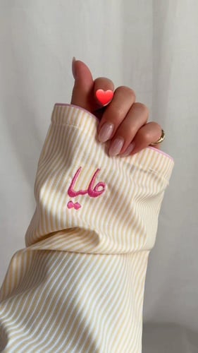 بجامة العيد النسائية بتصميم مخطط وأنيق