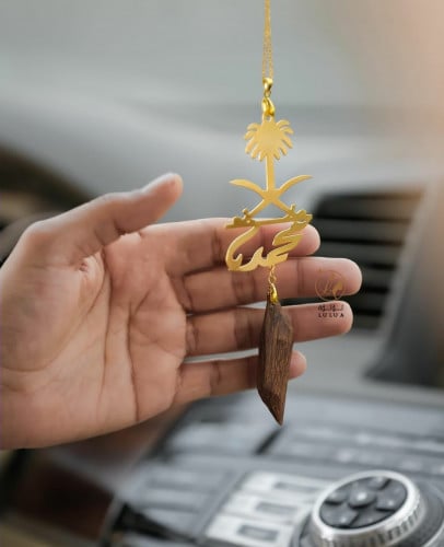 تعليقة عود وشعار المملكة