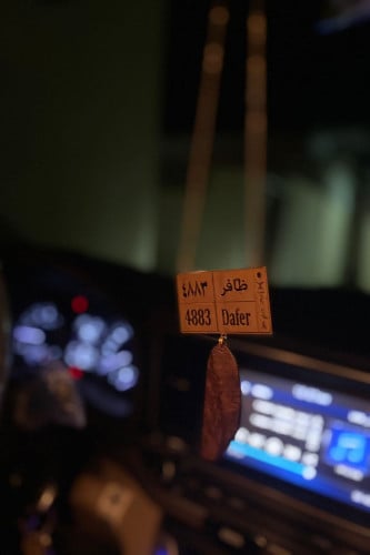 تعليقة لوحة سيارة مع عود