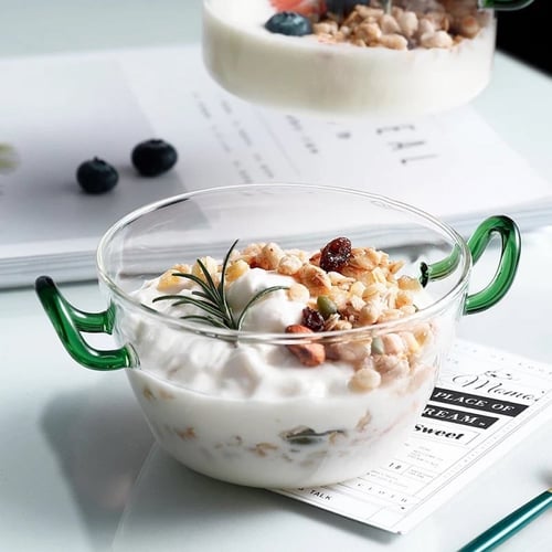 إناء زجاجي بممسك