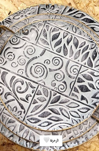 صينية تقديم حديد