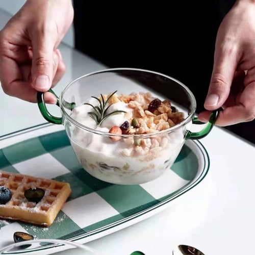 إناء زجاجي بممسك