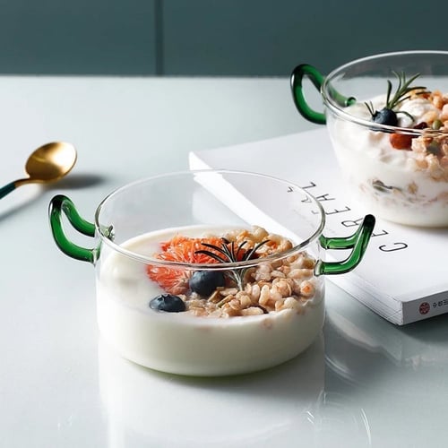 إناء زجاجي بممسك