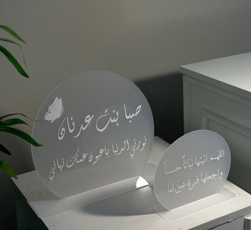 لوحتين دائرية اكريلك بحجمين مختلفة .