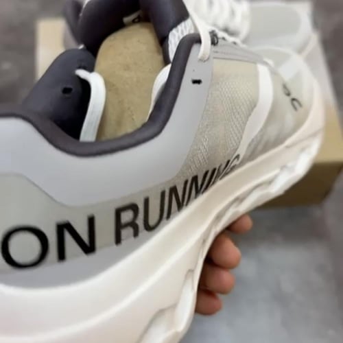 ON Cloudsurfer Next running trainers in all white