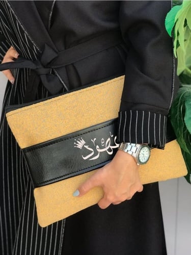 شنطة باوتش نوتيد قماش و حزام جلد متعددة الوان