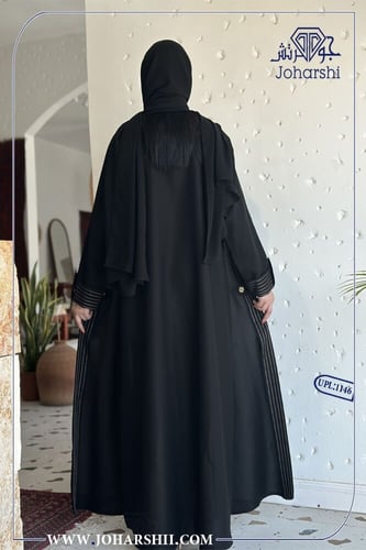 عباية كتان سوداء اسواره مع أزرار ذهبية