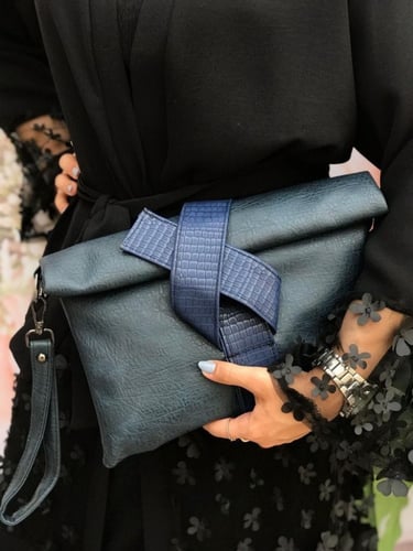 شنط باوتش نسائي بتصميم تويد أنيق