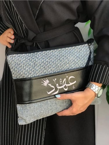 شنطة باوتش نوتيد قماش و حزام جلد متعددة الوان