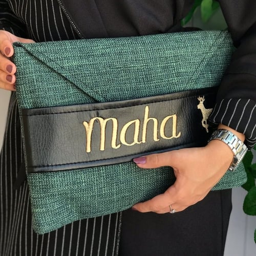 شنطه يد باوتش نسائي تطريز