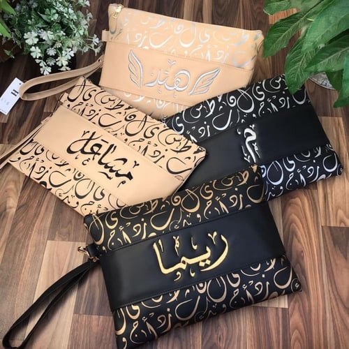 شنط باوتش نسائي سلفر بحروف عربية