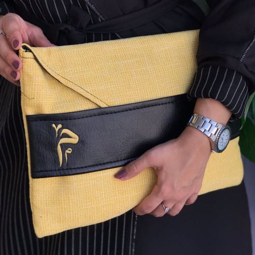 شنطه يد باوتش نسائي تطريز