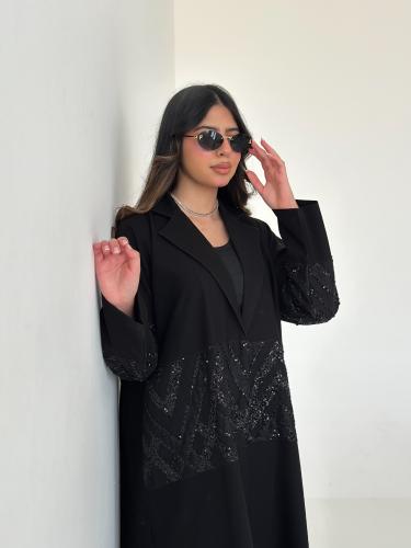 0375 عباية كريب وكلفة شك بالصدر والاكمام