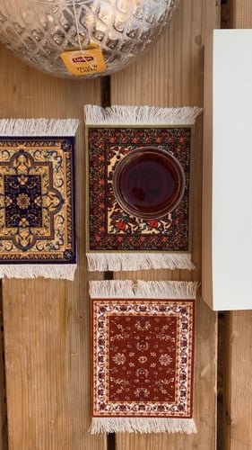 كوستر سجاد اخضر مزخرف .