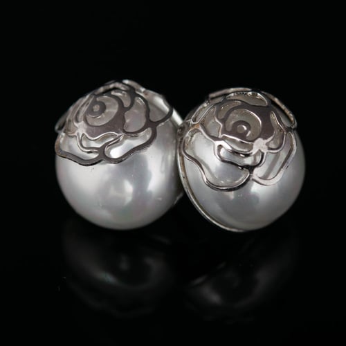 حلق فضة مع لؤلؤ فخامة وأناقة