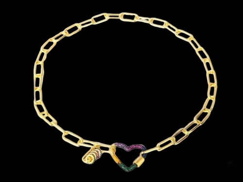 عقد فضة بطلاء ذهب بتصميم حديث وملفت مع احجار الزرك...