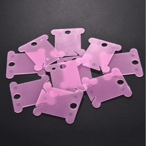 منظم خيوط باللون الزهري