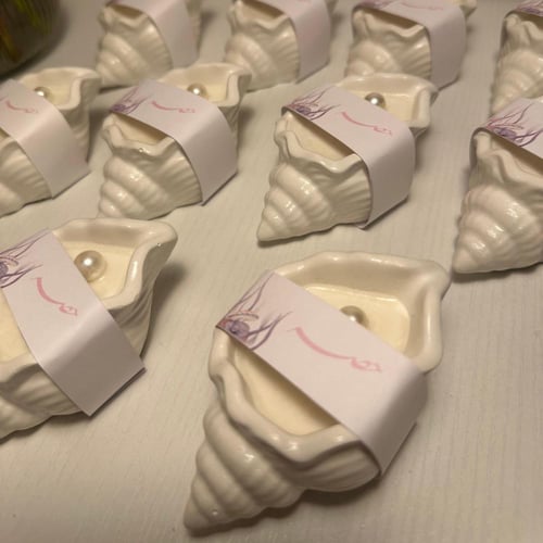 شمعة القوقعة(تغليف ورق)