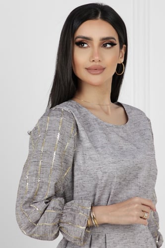 ثوب لنن بني و أصفر