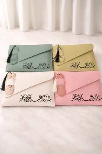 توزيعات حقيبه جلد