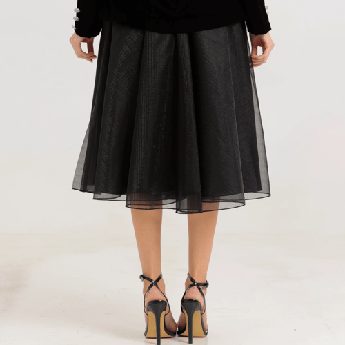 Black dress with silver buttons