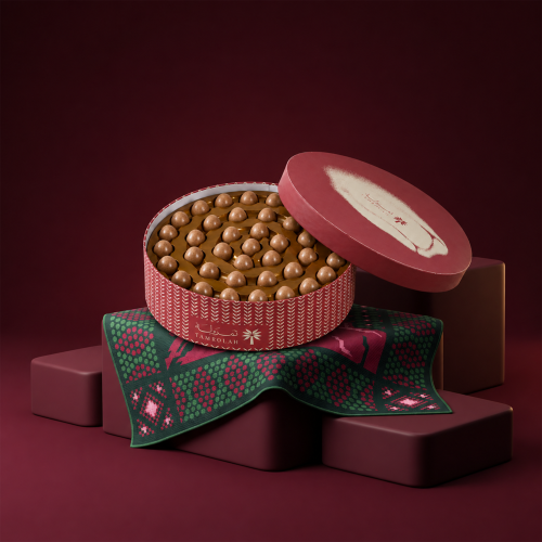 Box of milk chocolate with roasted date paste